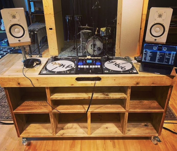 Handmade DJ booth deck stand and vinyl record storage unit on wheels